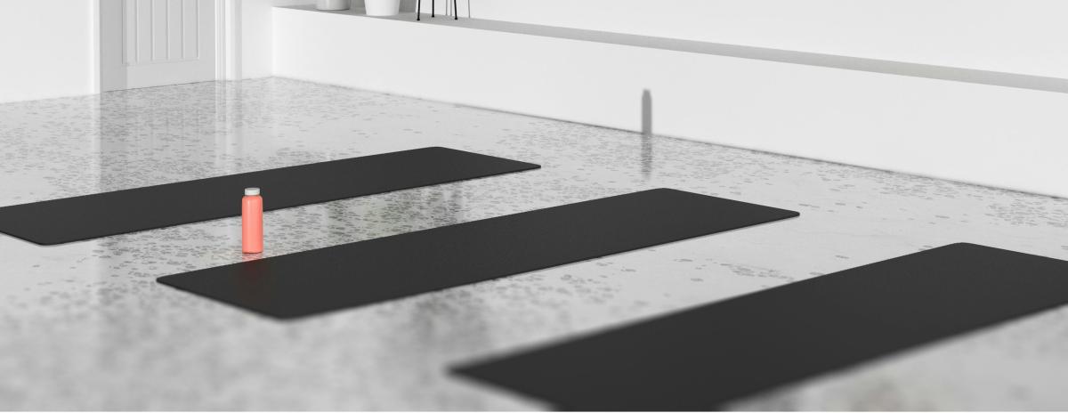 yoga mat and waterbottle on floor